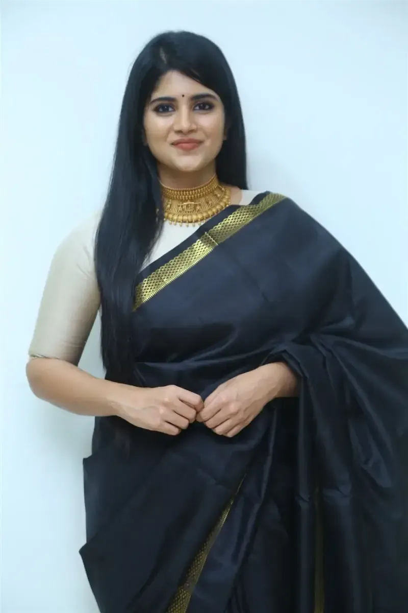 Megha Akash in Black Saree at Manu Charitra Telugu Movie Trailer Launch